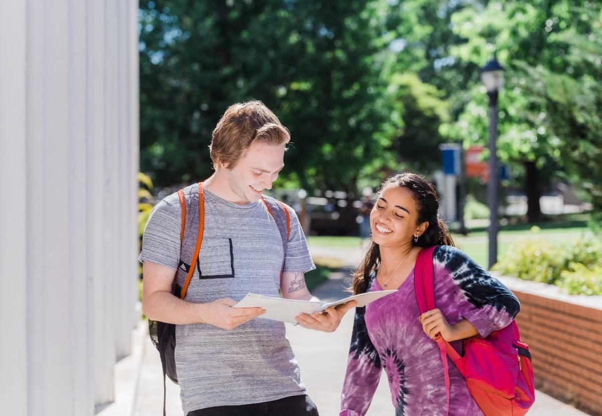 Two students talking outside